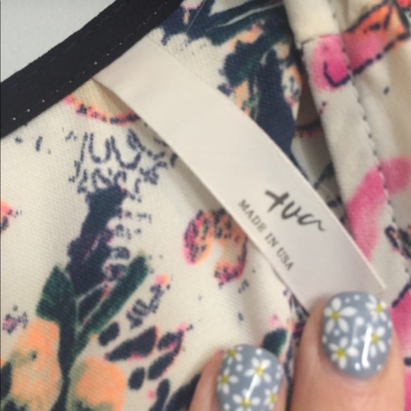 Super soft romper with lace trimming. - Picture 2 of 2